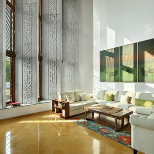 Modelo de salón de estilo zen con paredes blancas