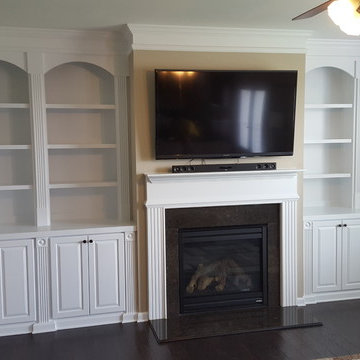 Double-Ached Fluted-Trim Fireplace Built-ins