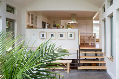 Inspiration for a mid-sized scandinavian concrete floor and gray floor sunroom remodel in Montreal
