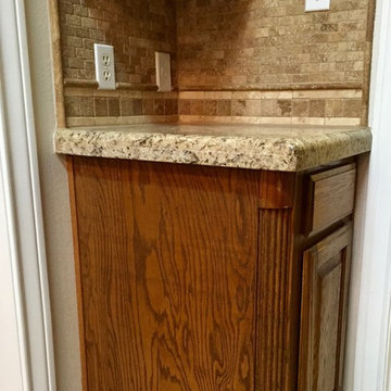 Bronco Bend - Angleton - Travertine Flooring/Granite Countertops
