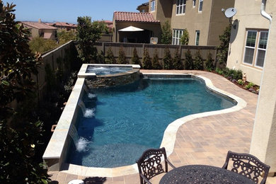 Tuscan pool photo in San Diego
