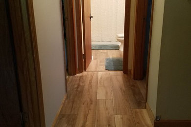 Bathroom - large traditional laminate floor and beige floor bathroom idea in Chicago