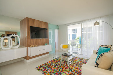 Small minimalist open concept porcelain tile and white floor living room photo in Miami with a bar, white walls, a wall-mounted tv and no fireplace