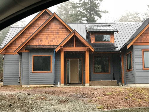 dark grey house with white trim