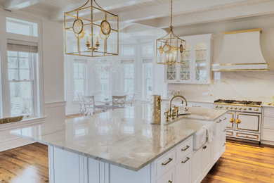 Example of a kitchen design in New York with shaker cabinets and white cabinets