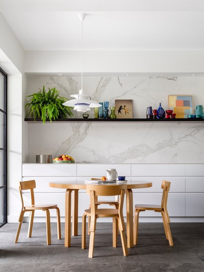 Contemporary Dining Room by ANNA CARIN Design