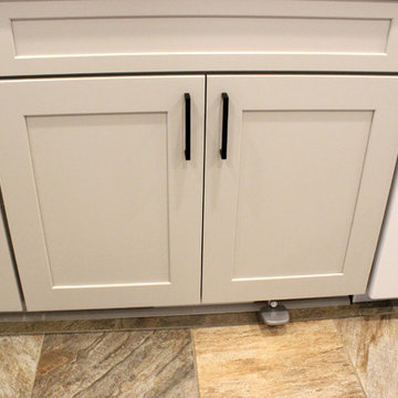 Gray and White Kitchen with Eternia Quartz and Marble Mosaic Backsplash