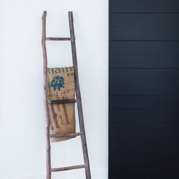 Rustic Ladder with Burlap Sack and Sliding Barn Door