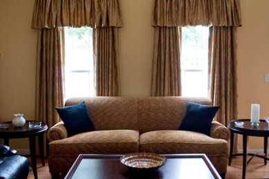 Large elegant formal and enclosed light wood floor living room photo in Boston with yellow walls