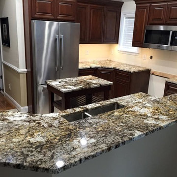Kitchen island and raised bar with granite countertops - Copenhagen 3cm.