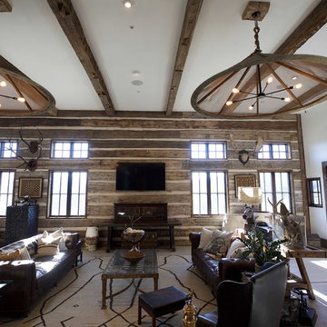 Hand Hewn Hammer Beams and Slab Siding with Oak Flooring