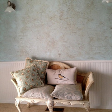 Glazed tissue finish with embossed stencil