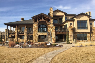 Tuscan exterior home photo in Denver