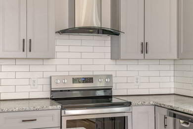Kitchen - modern kitchen idea in Other