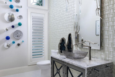 Beach style powder room photo in Miami