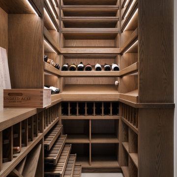 Modern Glass-Enclosed Wine Cellar with Custom Oak Racking | Chicago