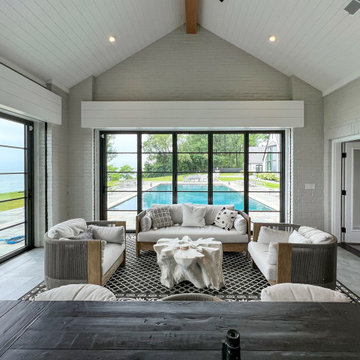 Simulated Divided Lites Give a Classic Steel Look Framing the Pool and Lake