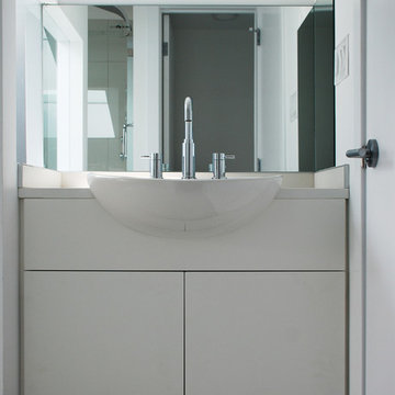 3-pc bathroom shares light from skylight with the 2nd floor corridor