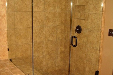 Example of a transitional bathroom design in Other