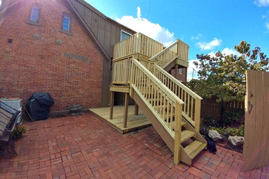 Deck - small traditional backyard deck idea in Columbus with no cover