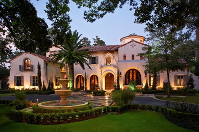 Tuscan exterior home photo in Houston