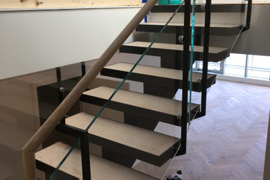 Minimalist staircase photo in Vancouver