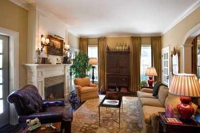 Living room - traditional formal and enclosed living room idea in Atlanta with beige walls, a standard fireplace and no tv