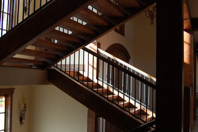 Mountain style staircase photo in Denver