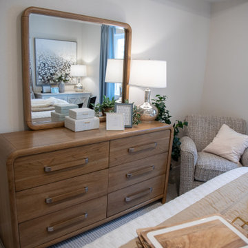 Contempo Dresser and Kipton II Swivel Glider Create a Relaxing Bedroom Retreat