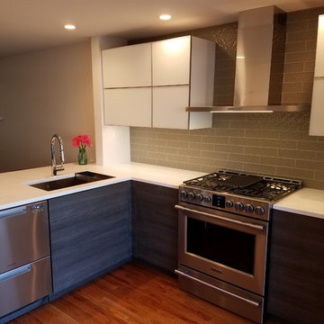By-fold glass upper cabinets.