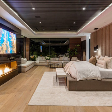 Bundy Drive Brentwood, Los Angeles luxury home primary bedroom with modern firep