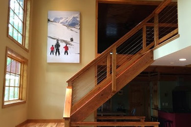 Inspiration for a rustic staircase remodel in Other