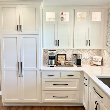 Cherry Finish and Ivory Painted Kitchen Design With Herringbone Wall Tile