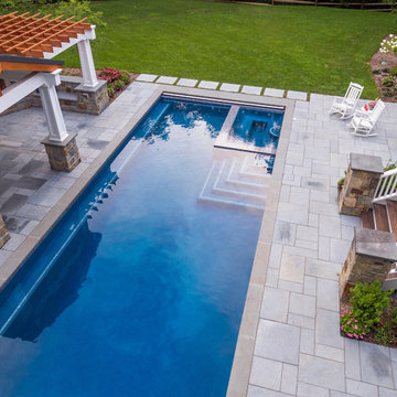 Formal pool and backyard retreat for a family in Basking Ridge