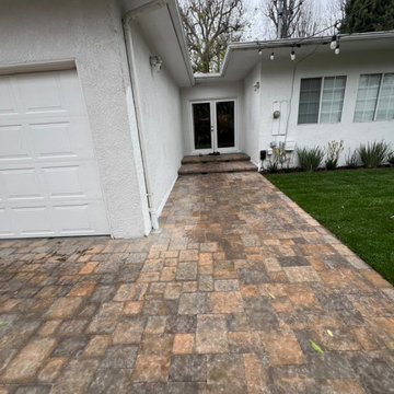 Warm-Tone Paver Entry with Seamless Indoor-Outdoor Flow