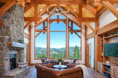 Example of a mountain style family room design in Denver