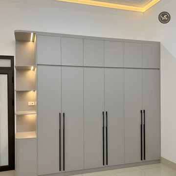 Soft Grey Floor-to-Ceiling Wardrobe with Sleek Black Handles