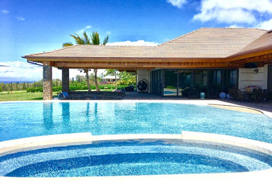 Water slide - large contemporary backyard stone and custom-shaped natural water slide idea in Hawaii