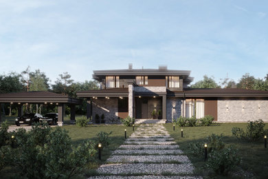 Идея дизайна: двухэтажный, коричневый частный загородный дом в современном стиле