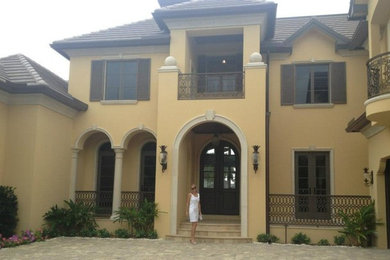 Inspiration for a tropical entryway remodel in Miami