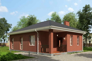 Источник вдохновения для домашнего уюта: маленький, одноэтажный, кирпичный, красный частный загородный дом в стиле ретро с вальмовой крышей и металлической крышей для на участке и в саду