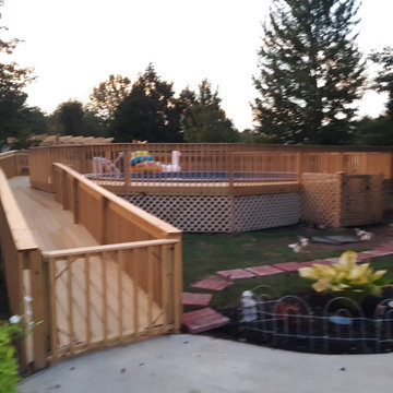 Custom built deck. 50ft walkway ramp, 5ft wrap around deck, step down 14x14 deck