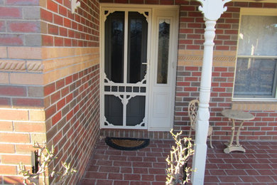Design ideas for a traditional entryway in Melbourne.