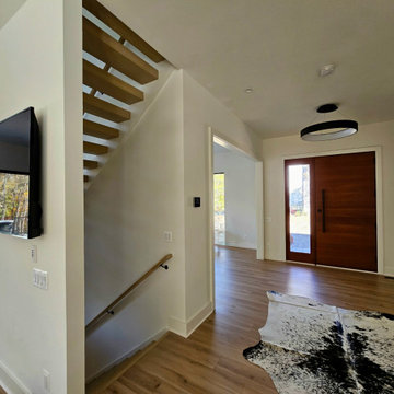 Project #111 | Open-Riser Staircase with Glass Panel Detail