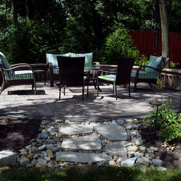 Circular Paver Patio With Natural Stone Landscaping in Gahanna Ohio