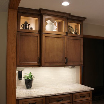 Maple Kitchen With Black and Gold Accents