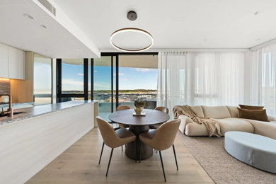 This is an example of a small contemporary open plan dining in Wollongong.