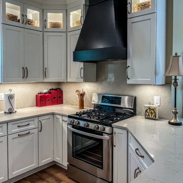 White Kitchen with Black Range Hood and Taj Royale quartz Countertops