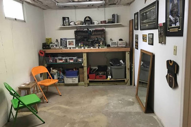 Basement de-clutter into organized storage area with work & play space
