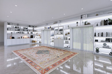 Imagen de sala de estar abierta actual grande sin televisor con paredes blancas y suelo de mármol